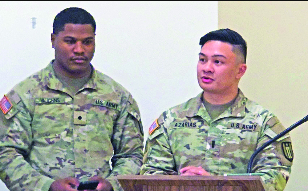 First Lt. Albert Azarias, right, delivers remarks at a change of command ceremony in December 2025. Azarias will serve as commander of the 317th Engineer Construction Company at the Army Reserve Center in Homewood. (Eric Crump/H-F Chronicle)