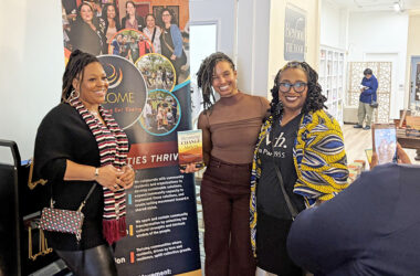 From left, Shemeka Woodson, Dominica McBride and Keisha Farmer-Smith pose for a photo in front of the BECOME banner at the Becoming Change Makers Book signing and women's event at Beyond the Book on Saturday, March 7. (Jamilah Lewis/H-F Chronicle)