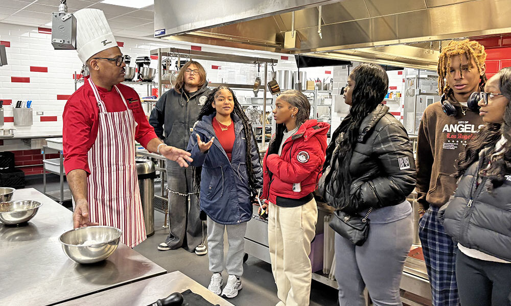 Chef Jerl Griffin speaks with students in a culinary class at Homewood-Flossmoor High School on March 20. (Marilyn Thomas/H-F Chronicle)
