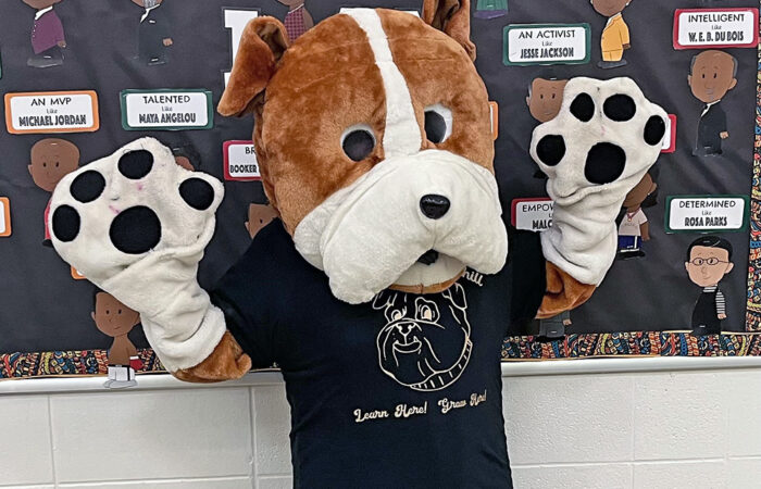 Winston the Bulldog, Churchill School's mascot, entertains at the Black History Month event on Feb. 26. (Nick Ulanowski H-F Chronicle)