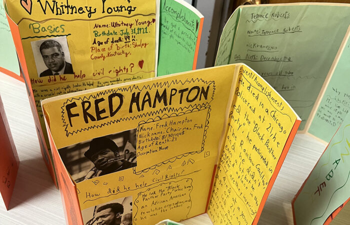 Churchill Elementary student posters with information about Black heroes is on display during the Black History Month event on Feb. 26. (Nick Ulanowski H-F Chronicle)
