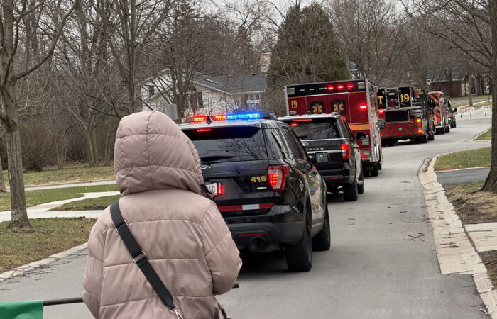 Flossmoor public safety vehicles lead the St. Patrick's Day Parade. (Nick Ulanowski / H-F Chronicle)