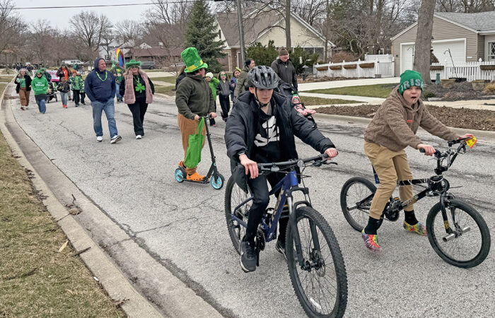 Kids on two wheels lead the way during the Flossmoor St. Patrick's Day Parade on March 14. (Nick Ulanowski/H-F Chronicle)