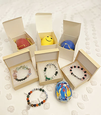 Some of the stress balls and affirmation bracelets handcrafted and sold by Neal Armstrong Elementary's entrepreneurship program, led by Gobble Doggs owner Annah Mitchell. (Provided photo)