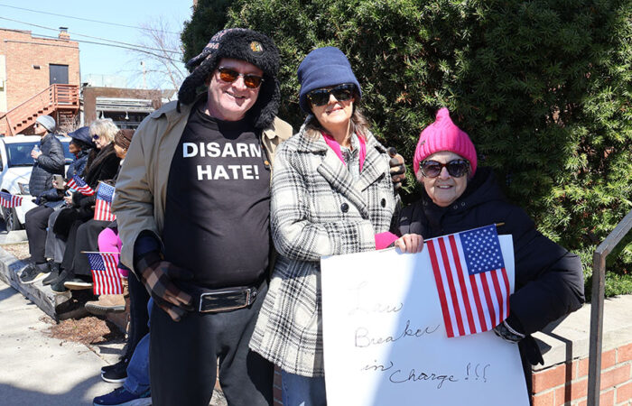 Robert Baggot stands with his wife and mother during Saturday’s rally in Homewood. Baggot said the crowd spoke for itself, calling it “all these incredible people,” while his mother said the day “provided hope.” (Nuha Abdessalam/H-F Chronicle)