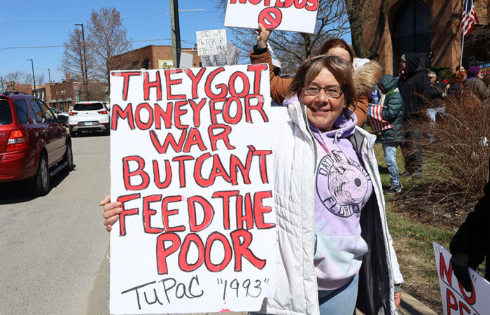 “We The People” sign outlining concerns over federal power and due process during the rally in Homewood. (Nuha Abdessalam/H-F Chronicle)