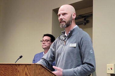 Holladay Properties CEO Drew Mitchell describes the company's experience and plans for developing two sites in downtown Homewood at the March 10 board meeting. (Eric Crump/H-F Chronicle)