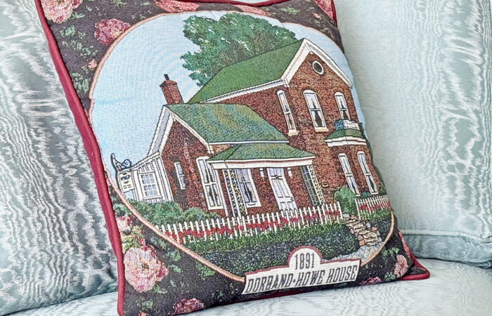 A pillow carries one of Elaine Egdorf’s drawings of the Dorband-Howe House, which she saved from demolition. (Karen Torme Olson)