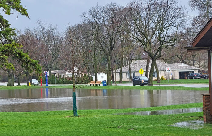 The site of winter ice skating rinks at Flossmoor Park are full of liquid water early Saturday, April 4. (Eric Crump/H-F Chronicle)