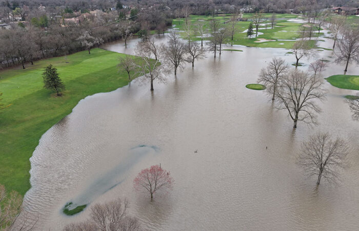 An aerial look at flood water flowing through Idlewild Country Club. The photo was taken about 9 a.m. Saturday, April 4. (Logan Cogswell/provided)
