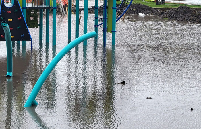 The partially constructed new playground equipment at Irwin Park gets soaked from rains overnight. (Eric Crump/H-F Chronicle)
