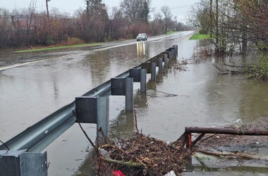 Water remains over the roadway on Governors Highway just south of the Cherry Creek shopping center shortly before noon on April 4, the result of torrential rains overnight. (Eric Crump/H-F Chronicle)