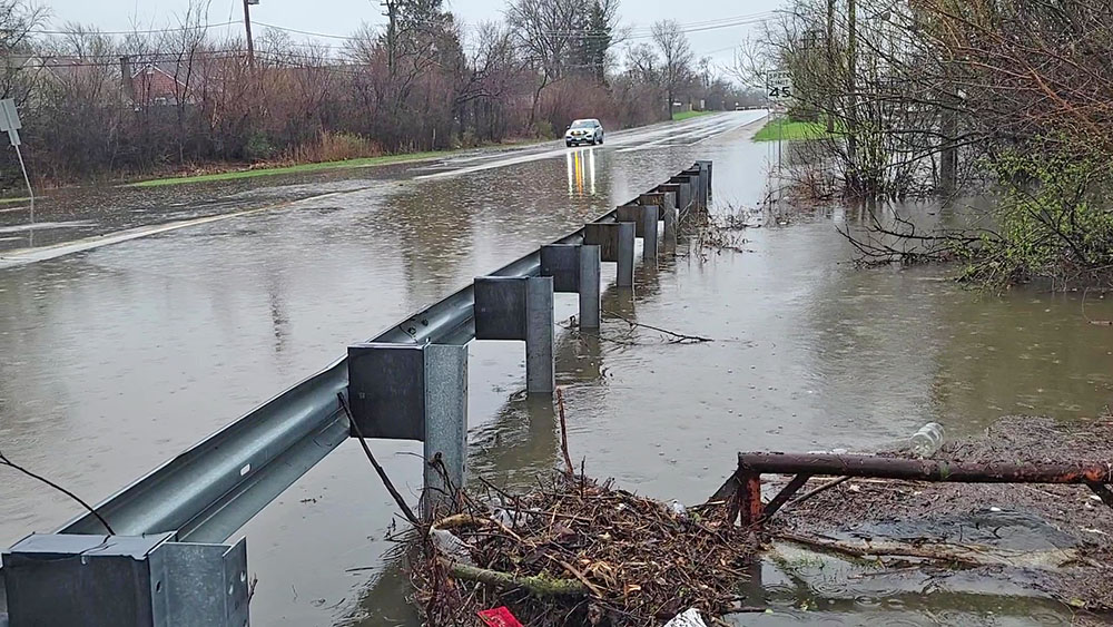 Water remains over the roadway on Governors Highway just south of the Cherry Creek shopping center shortly before noon on April 4, the result of torrential rains overnight. (Eric Crump/H-F Chronicle)