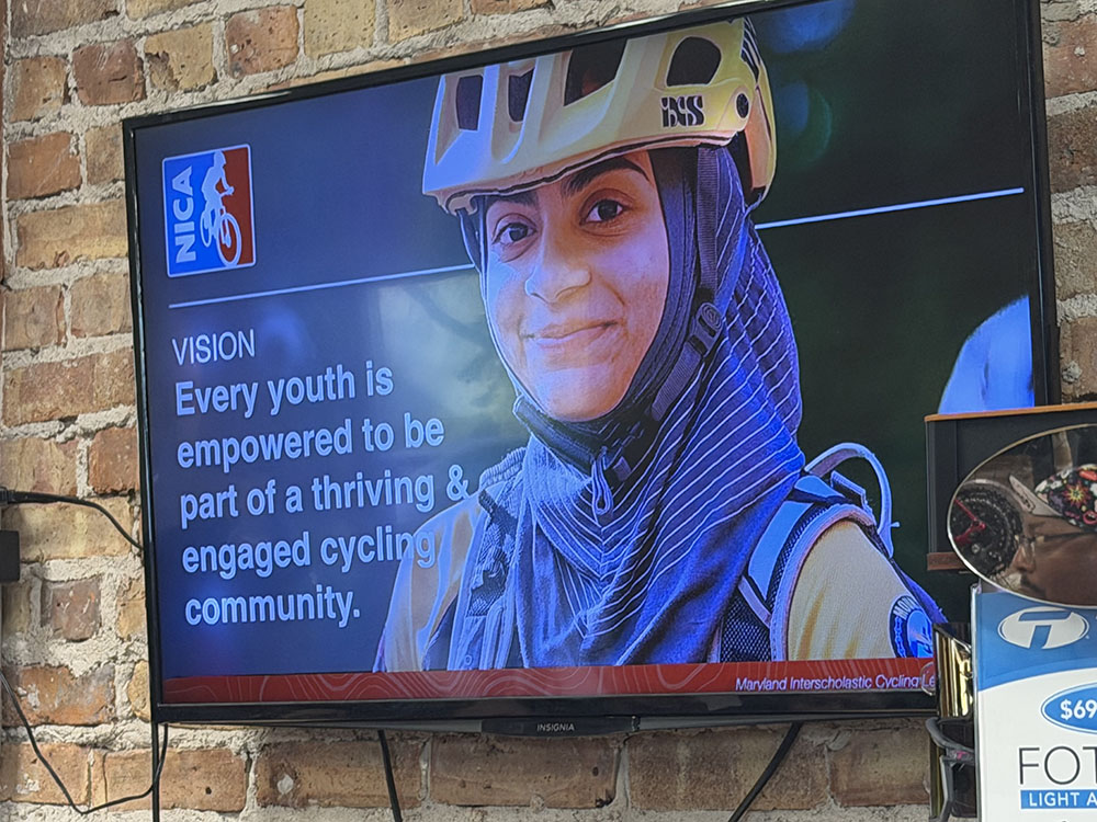 One of the slides in the NICA slideshow presentation promotes youth cycling. (Nick Ulanowski / H-F Chronicle