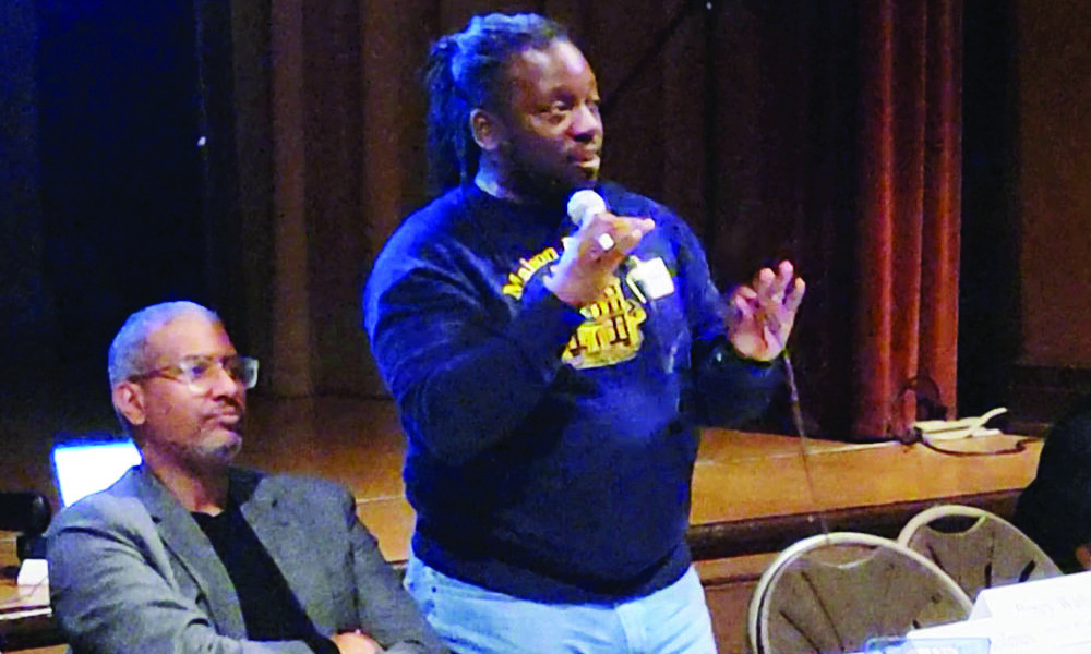 Qadree Holmes, co-founder of the Flossmoor Gentlemen's Caucus, speaks at the organization's general meeting in February. The group plans to focus on community service, schools and non-partisan political activites. (Eric Crump/H-F Chronicle)
