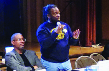 Qadree Holmes, co-founder of the Flossmoor Gentlemen's Caucus, speaks at the organization's general meeting in February. The group plans to focus on community service, schools and non-partisan political activites. (Eric Crump/H-F Chronicle)