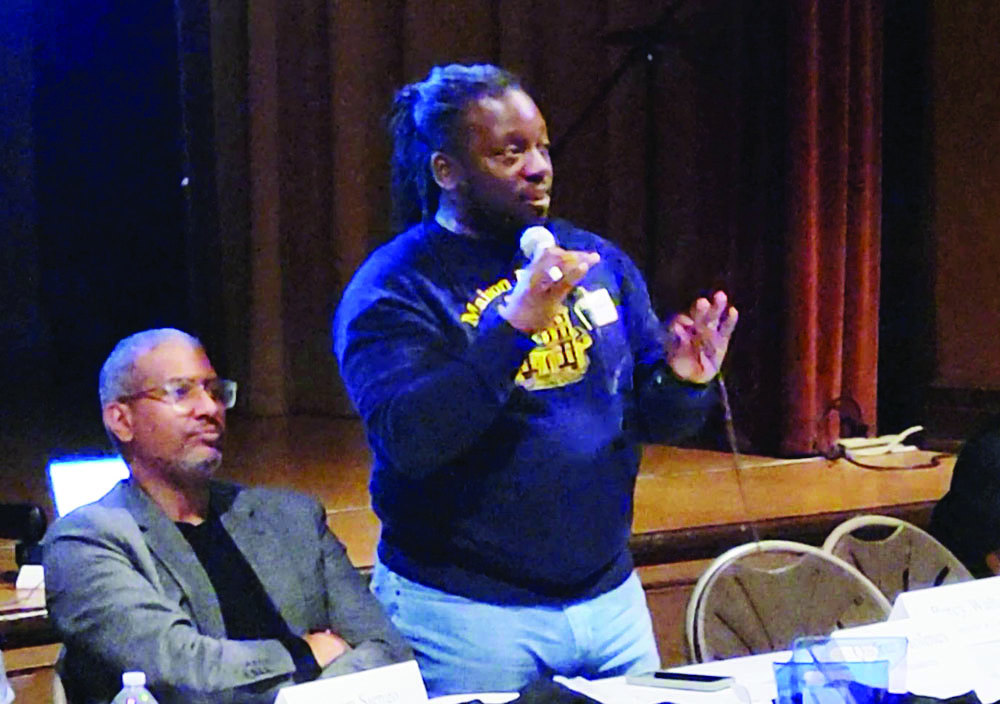 Qadree Holmes, co-founder of the Flossmoor Gentlemen's Caucus, speaks at the organization's general meeting in February. The group plans to focus on community service, schools and non-partisan political activites. (Eric Crump/H-F Chronicle)