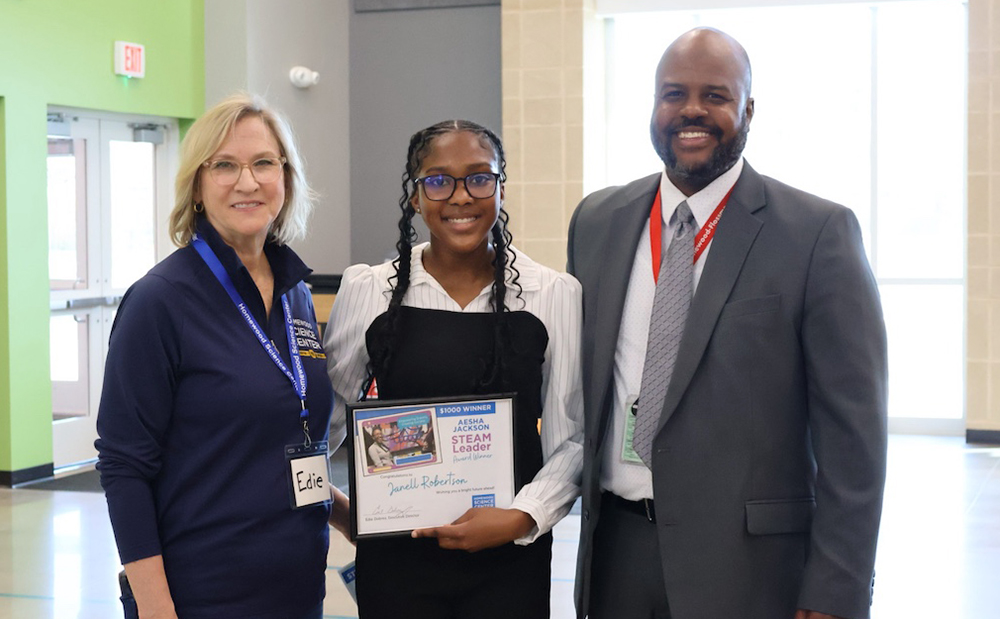From left, Edie Dobrez, executive director of the Homewood Science Center; Janell Robertson, winner of the Aesha Jackson STEAM Leader Award recipient; and Evan Roberts, science department lead at Homewood-Flossmoor High School. (Nuha Abdessalam/H-F Chronicle)