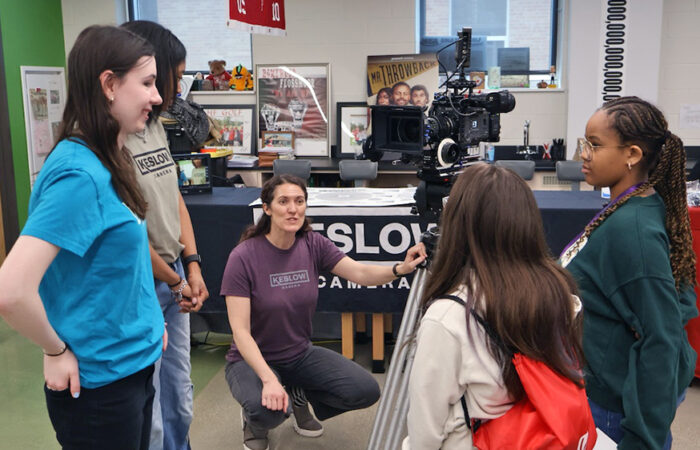 Students listen as a presenter explains camera equipment during a hands-on session at the Girls STEAM Celebration on April 11 at H-F High. (Nuha Abdessalam/H-F Chronicle)