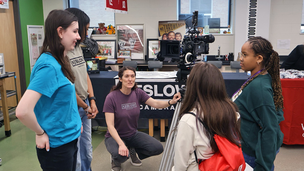Students listen as a presenter explains camera equipment during a hands-on session at the Girls STEAM Celebration on April 11 at H-F High. (Nuha Abdessalam/H-F Chronicle)