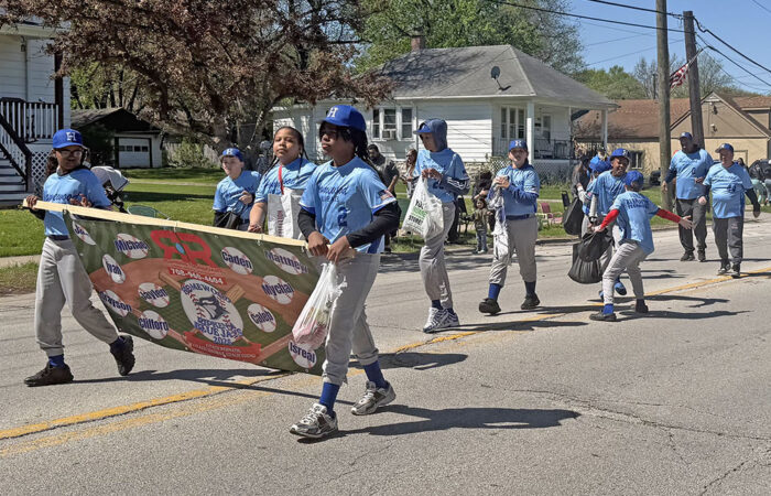 The Homewood Ripken League Bluejays march in the opening day parade on April 25. (Nick Ulanowski/H-F Chronicle)