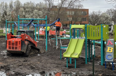Crews are busy building the new play equipment at Irwin Park in Homewood, replacing equipment that dated to 1986. (Marilyn Thomas/H-F Chronicle)