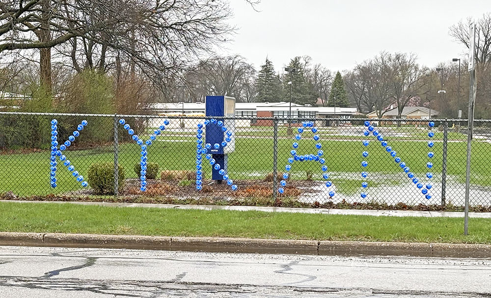A fence at Parker Junior High was decorated to spell Kyran Smith's name. The eighth grader died in a car accident March 22. (Marilyn Thomas/H-F Chronicle)