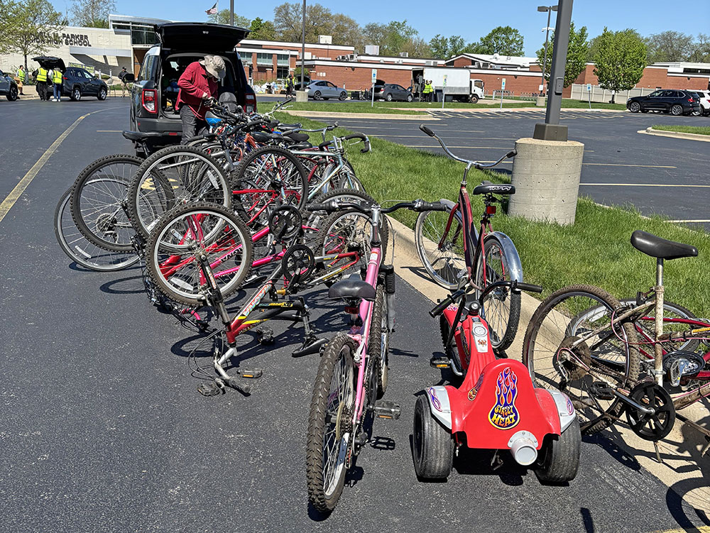 Cast off bikes like the curb at Recyclepalooza. More than two dozen bikes for riders of all ages were donated. (Marilyn Thomas/H-F Chronicle)