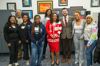 Clerk Monica Gordon, center, with student election judges at their polling place in Hillcrest High School, one of the 24 participating schools. (Provided photo)