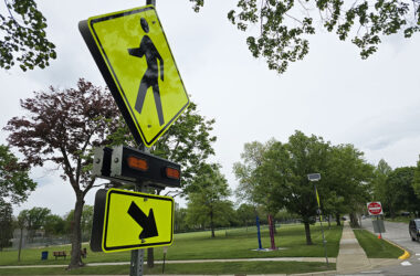 Flossmoor recently installed a new flashing crosswalk sign at Flossmoor Road and Brassie Avenue to help improve pedestrian safety near Flossmoor Park and Western Avenue School. (Eric Crump/H-F Chronicle)