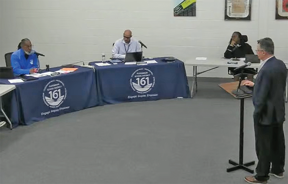 Michael Eichhorn, right, education practice leader for Wold Engineers and Architects, answers questions from Flossmoor School District 161 board members. (Provided screenshot from D161 meeting video)