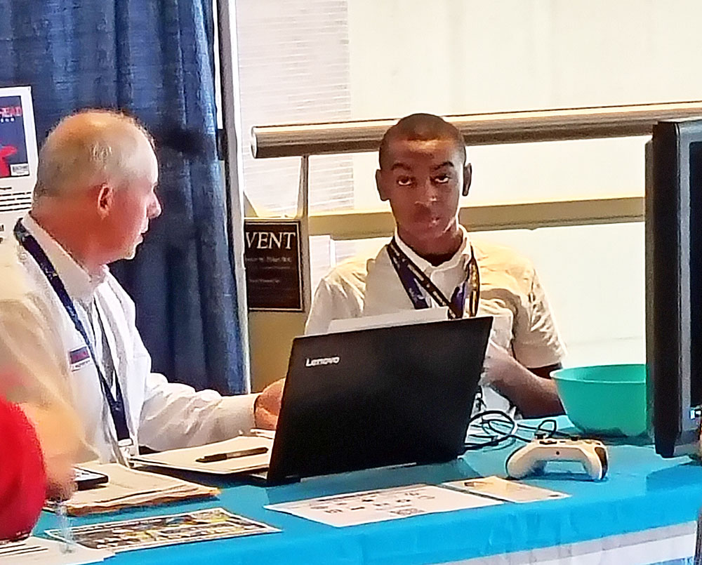 Homewood-Flossmoor High School freshman Noah Johnson, seated at right, participated in the SkillsUSA Illinois Facilithon competition, winning fourth place. (Provided photo)