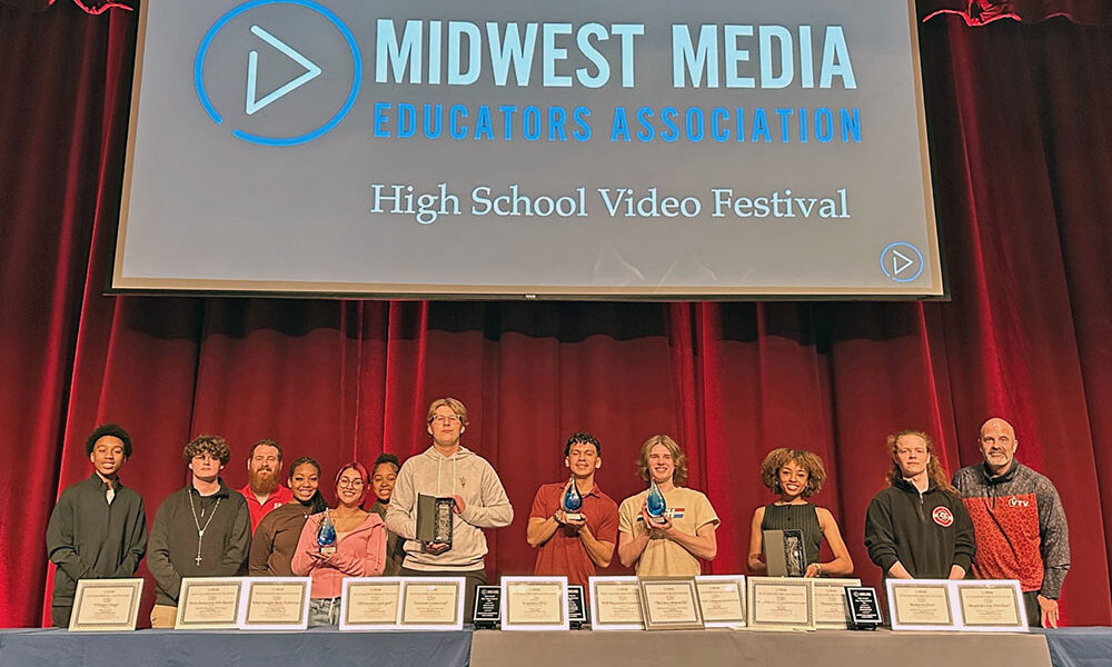 Homewood-Flossmoor High School teachers join their students who proudly show off their trophies at the Midwest Media Educators Association video festival. The students won 17 awards. (Provided photo)