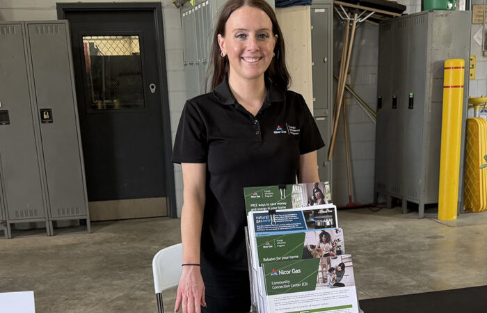 Hwd public works -Ulanowski10_web Nicor Gas marking and outreach representative Mary Kate Naughton provides information to guests at the Homewood Public Works Open House on May 16. (Nick Ulanowski / H-F Chronicle)