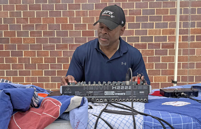 Hwd public works -Ulanowski9_web Homewood Village Manager Napolean Haney serves as DJ for the annual Public Works Open House on May 16. (Nick Ulanowski / H-F Chronicle)