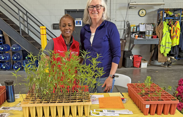 Hwd public works open house -Ulanowski2_web Homewood Public Works employee Sylvia Alexander, left, operates the Beautification Committee booth with Homewood resident Anne Knoeppel during the Public Works Open House on May 16. (Nick Ulanowski / H-F Chronicle)