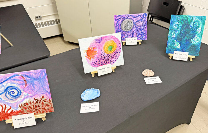 You Matter 2 fundraiser -Ulanowski9_web Some of the paintings that students made in You Matter 2‘s art therapy program. (Nick Ulanowski / H-F Chronicle)