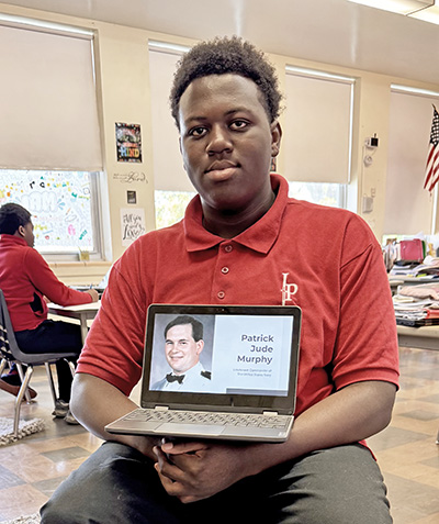 IJP 8th grader Brenden Lacey of Country Club Hills is researching Lt. Cmdr. Patrick J. Murphy for his FVM Time Machine project. (Karen Torme Olson)