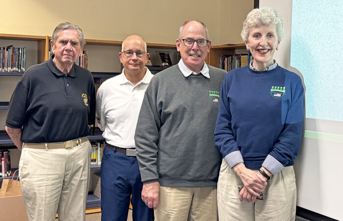 fvm-photo-7-fvm-directors_web The FVM project and Flossmoor Veterans’ Time Machine directors (from left) John Beele, Anthony Manos, Paul Braun and Kristine M. Condon address 8th grade social studies students at Time Machine project kickoff at Parker Junior High School. (Karen Torme Olson)