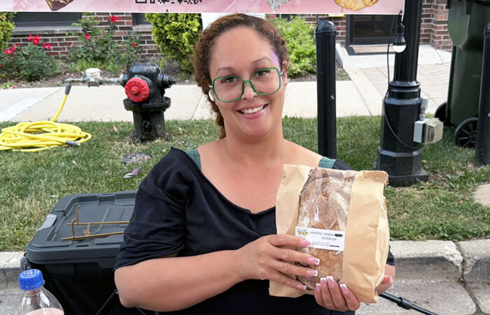 Art & Garden -Ulanowski10_web Nikki Garden operates the OMG Pastries booth at the Homewood Art & Garden Fair. (Nick Ulanowski / H-F Chronicle)