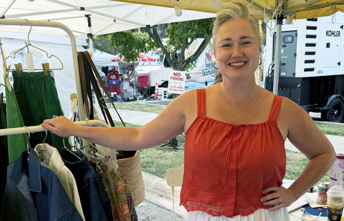 Art & Garden -Ulanowski13_web Poppette owner Megan Rork poses with her wares at the Homewood Art & Garden Fair. (Nick Ulanowski / H-F Chronicle)