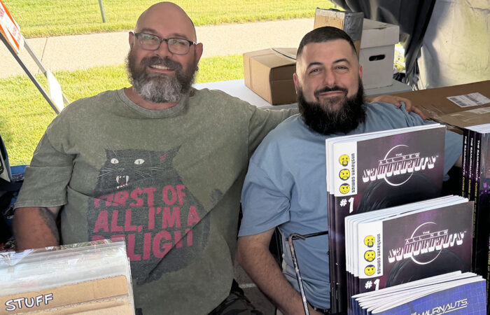 Art & Garden -Ulanowski9_web Local artists Matt Wright, left, and Marc Alan Fishman of Unshaven Comics are prepared to talk with fans at the Homewood Art & Garden Fair. (Nick Ulanowski/H-F Chronice)