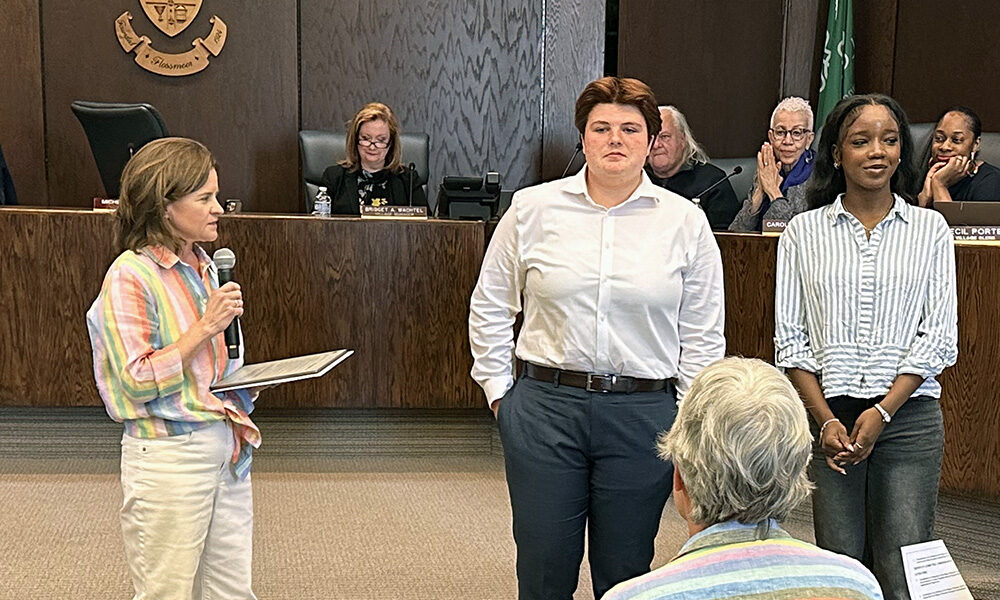 Mayor Michelle Nelson recognizes Annie Ford and Amariyah Raickett, recent high school graduates who each received $1,000 fellowships from the Lighthouse LGBTQ Foundation. (Jon Bannister/H-F Chronicle)