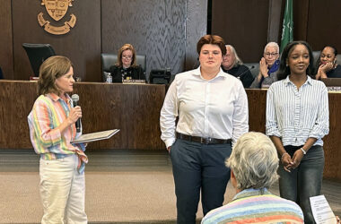Mayor Michelle Nelson recognizes Annie Ford and Amariyah Raickett, recent high school graduates who each received $1,000 fellowships from the Lighthouse LGBTQ Foundation. (Jon Bannister/H-F Chronicle)