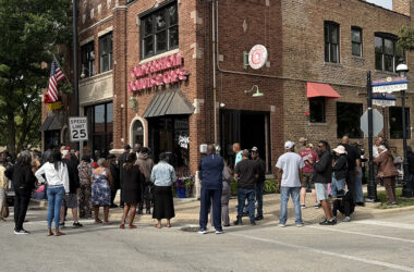 A crowd lines up around the block for the grand opening of Old Fashion Donuts & Cafe. (Nick Ulanowski / H-F Chronicle)