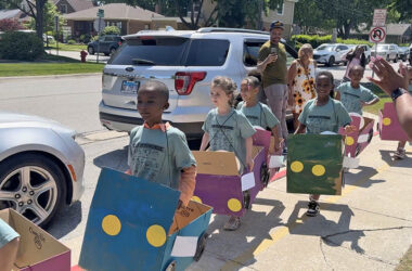 Willow School students show off their hand-crafted "cars" during the annual box car parade. (Jon Bannister/H-F Chronicle)