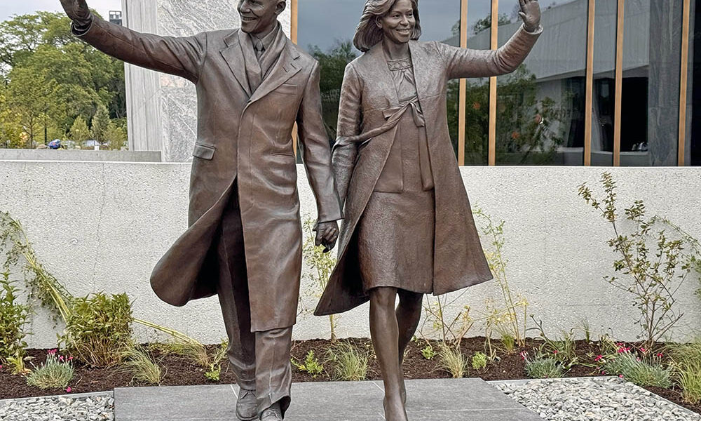 A statue depicting Barack and Michelle Obama as they waved to spectators along Pennsylvania Avenue after Obama’s first inauguration has become a popular site for photos even before the Center’s official opening. (Karen Torme Olson/H-F Chronicle)