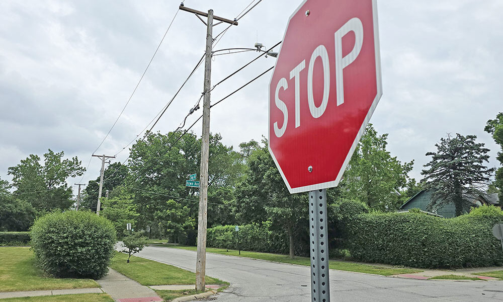 One of two new stop signs added at Cedar Road and Howe Avenue by Homewood staff to replace yield signs at the request of residents concerned about cut-through traffic during the Dixie Highway viaduct drainage improvement project this summer. (Eric Crump/H-F Chronicle)