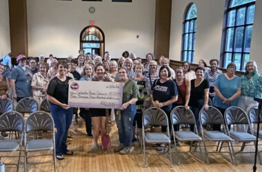 Members of 100+ Women Who Care South Suburbs gather after wrapping up their first four meetings. The group has helped fund local nonprofits serving communities across the South Suburbs. (NUha Abdessalam/H-F Chronicle)