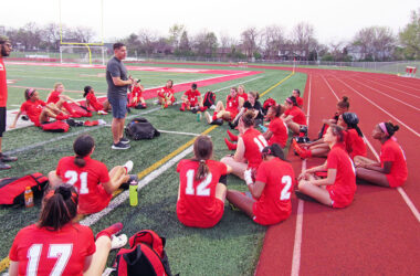 Coach Jairo Garcia speaks to the Homewood-Flossmoor girls team, for which he's an assistant coach. He's also the head boys coach and a Vikings alum. (Provided photo)